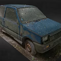 Old Blue Car With Rust And Fallen Leaves Parked On Weathered Ground