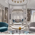 Modern Elegant Bridal Shop Interior With Chandelier Mannequins Wedding Dresses And Round Display Tables