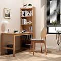 Wooden Bookcase with Books Near Wooden Desk Chair Potted Plant Window Blinds and Framed