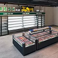 Fresh Meat Display Freezers In Retail Store With Glass Doors And Storage Shelves