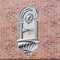 Elegant White Wall Sconce With Lion Head Decoration On Red Brick Wall