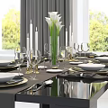Elegant Dinnerware Set With Calla Lilies Candles Wine Glasses And Plates