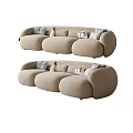 Modern Three Seater Sofa In Beige Fabric With Curved Design And Decorative Pillows