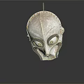Traditional Cultural Mask With White Surface Black Accents And Large Eyes