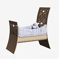 Wooden Baby Crib With Carved Headboard Light Colored Sheet And White Teddy Bear