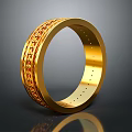 Elegant Gold Ring With Intricate Engraved Design And Shiny Polished Finish