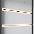 Modern Linear Pendant Lights With Textured Design Hanging In Interior Space 3d model