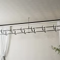Modern Linear Metal Chandelier in Minimalist Interior With White Curtains And Green Plant