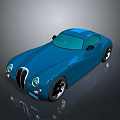 Vintage Blue Sports Car With Streamlined Body Round Headlights And Black Wheels