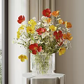 Transparent Glass Vase With Red Yellow Flowers And White Daisies On White Table Near Window