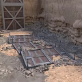 Rustic Stone Walls With Wooden Door And Metal Grating On Gravel Ground
