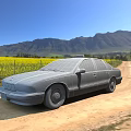 Yellow Sedan Parked On Dirt Road With Yellow Flower Field And Mountains Under Blue Sky