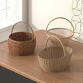 Three Woven Storage Baskets Placed On Wooden Table With Window And Geometric Wall