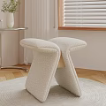 Beige Woven Stools On Wooden Floor With Metal Side Table And White Vase