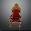 Ornate Royal Chair With Golden Carved Frame And Red Velvet Upholstery