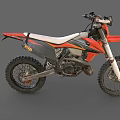 Orange and Black Motocross Motorcycle With Large Off Road Tires And White Seat