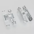 Pair of Precision Engineered Silver Metal Mechanical Connector Parts With Multiple Screws
