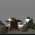 Natural Wicker Outdoor Sofa With Round Table And Green Plants In Garden