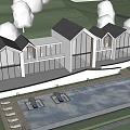 Modern Boutique Hotel Building With White Exterior Gabled Roofs And Large Glass Windows