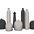 Elegant Black and White Ceramic Vases with Diverse Shapes and Modern Design