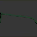 Green Sunglasses With Square Frame Green Lenses And Metal Rivets On Smooth Reflective Surface