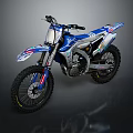 Off Road Dirt Bike in Blue and White with Vibrant Graphics on Dark Backdrop
