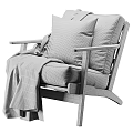 Black Leather Leisure Chair With Wooden Frame Beige Pillow And Chevron Blanket