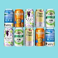 Assorted Canned Drinks With Various Flavors And Brands On Light Blue Background