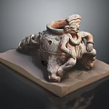 Ancient Terracotta Sculpture Featuring Human Figure Seated On Pottery Jar And Square Base