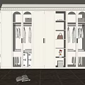Modern Walk-in Closet Interior With White Cabinets Glass Doors Wooden Flooring And Potted Plant