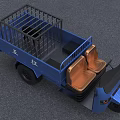 Blue Three Wheel Motorcycle With Open Cargo Bed Railings Headlights And Driver Seat