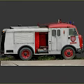 Red And Gray Fire Truck Model With Red Wheels Emblem Display Base And Green Grass