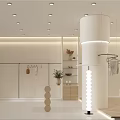 Minimalist Clothing Store Interior With White Column Clothing Racks Mirrors And Display Stand