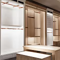 Modern Fashion Store Interior Design With Mannequin Display Racks Clothing And Logo