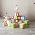 Colorful Educational Alphabet Blocks With Chicken Toys Pencils And Green Plant