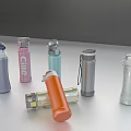 Different Colored Water Bottles With Flip Lids And Sleek Designs On