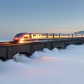 Early Morning Landscape Featuring HighSpeed Train Crossing Bridge In Morning Fog Under Light Blue Sky