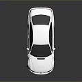 Sporty Silver Car With Black Roof White Rims And Shiny Body Design