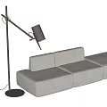 Gray Sectional Sofa With Black Floor Lamp In Modern Living Room