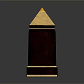 Decorative Dark Wooden Tower Like Architectural Element With Golden Trim And Pointed Top