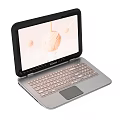 Modern Silver Laptop With Light Colored Keyboard And Graphic Display Screen