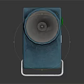 Blue Casing Device With Circular Transparent Section Green Adjustment Knob And White Metal Stand