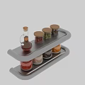 Spice Jars with Wooden Lids and Various Spices on Double Layered Kitchen Rack
