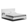 Modern Minimalist Double Bed With Upholstered Headboard Gray Sheet Two Pillows And Black Legs