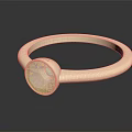 Elegant Gold Ring With Oval Pink Gemstone And Polished Band Design