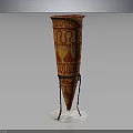 Artistic Vase With Red And Yellow Patterns On Black Stand And White Base