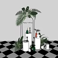 Happy Birthday Party Setup With Black Metal Arch Green Plants And White Cylindrical Decor Stands