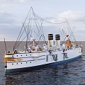 Vintage White Yacht With Gold Accents Sailing On Ocean Under Cloudy Sky