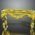 Elegant Golden Coffee Table With Ornate Carved Details And Decorative Legs