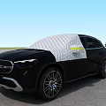 Black Mercedes SUV With White Protective Cover On Body Parked In Open Area